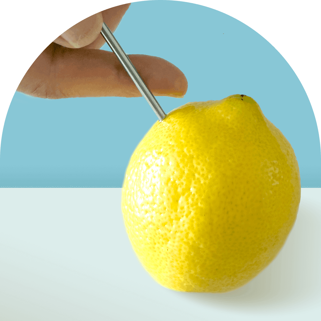 Lemon with a straw